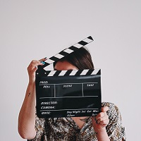 person with clapboard